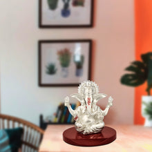 Load image into Gallery viewer, Diviniti 999 Silver Plated Four Hand Ganesha Idol For Car Dashboard, Home Decor, Tabletop, Puja Room and Gift (7.5 X 6 CM)
