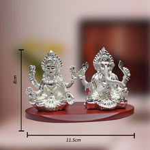 Load image into Gallery viewer, DIVINITI 999 Silver Plated Goddess Lakshmi and Lord Ganesha Statue Idol For Home &amp; Office Decor, Car Dashboard, Puja Room, Gift (8x11.5 CM)
