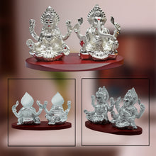 Load image into Gallery viewer, DIVINITI 999 Silver Plated Goddess Lakshmi and Lord Ganesha Statue Idol For Home &amp; Office Decor, Car Dashboard, Puja Room, Gift (8x11.5 CM)
