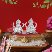 Load image into Gallery viewer, DIVINITI 999 Silver Plated Laxmi Ganesh Ji Idol Statue Radiant Symbol of Wealth and Wisdom for Home Office Décor, Puja Room, Tabletop Gift (6x5 CM)
