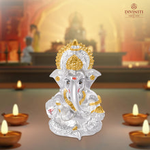 Load image into Gallery viewer, Diviniti 999 Silver Plated Lord Ganesha Idol for Car Dashboard Tabletop for Home Decor Mandir Puja Gift Silver &amp; Gold (8.4x4.2cm)
