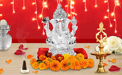 DIVINITI 999 Silver Plated Lord Ganesha Idol For Home Decor, Showpiece, Table Top, Puja Room, Gift (10x7 CM)